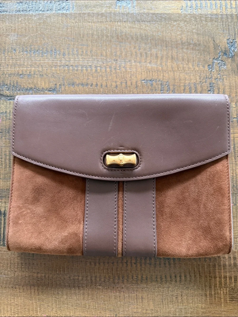 J McLaughlin leather and suede clutch